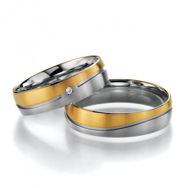 Trauringe Weiss-Gelbgold von Ruesch 66/20370-055