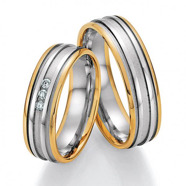 Trauringe Weiss-Gelbgold von Ruesch 66/34090-060